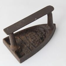 Antica piastra in ferro fuso