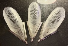 Degué.  Un trio di applique