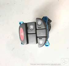 71711168 Interruttore luci emergenza  LANCIA Y 1.2 LE Ber. 3p/b/1242cc