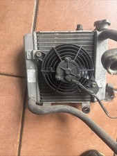 RADIATORE CON ELETTROVENTOLA HONDA PANTHEON 125 - 150 4 TEMPI