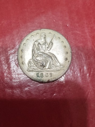 Monets half dollar 1861 - half,