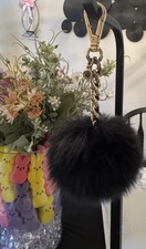 Ciondolo borsa pom-pom in