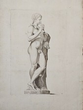 Statua di un fauno con flauto