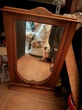 Specchio con cornice in legno