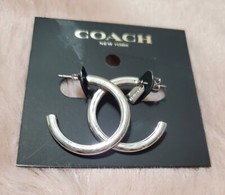 Orecchini a cerchio COACH in