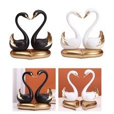2 figurine di coppia di cigni