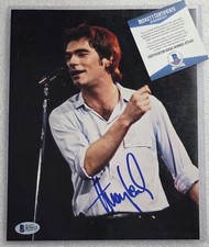 FOTO FIRMATA HUEY LEWIS