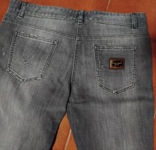 Jeans Dolce e Gabbana, neri, vita bassa con graffi fatti appposta sulle gambe da