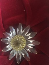 Statuina margherita gialla