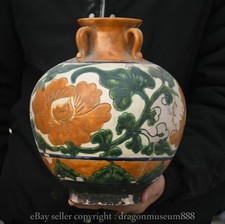 Vaso bottiglia fiori palazzo