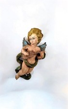 Antica scultura in legno di un