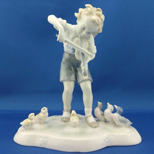 Violinista ragazzo porcellana