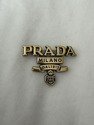 Spilla spilla logo tono oro