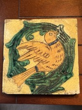 Antica piastrella colomba