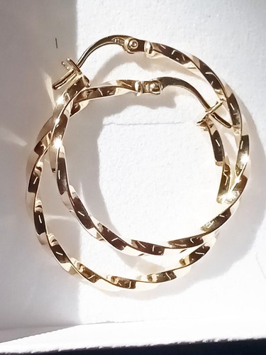 Orecchini oro giallo - a, forma
