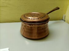 pentola di rame con coperchio