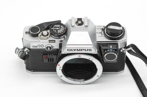 Olympus adattatore - +,