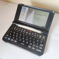 Sharp IQ-8920 Organizzatore Personale Portatile Elettronico PDA Computer 