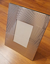 Cornice / Portafoto in acciaio