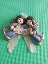 Thun formella angeli