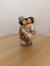 Thun coppia sposini con fiori