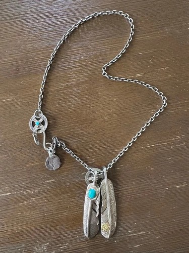 Collana piume stile shun - di,