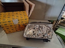 Faro anteriore proiettore sx per Volkswagen Polo III 10/99 Hella 1DF963709051