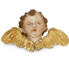 Scultura in legno policromo rappresentante un cherubino