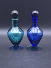 Coppia di bottiglie in vetro