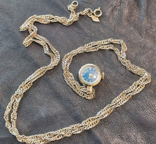 lunga collana con orologio