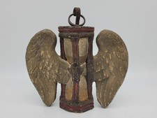 Antica scultura clessidra