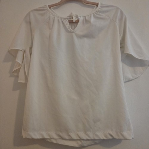 Blusa bianca liscia floreale