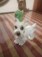 White ceramic dog figurine