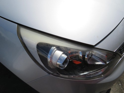 Faro proiettore anteriore lato