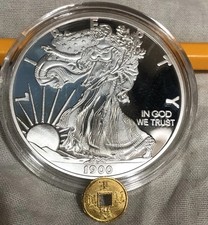 2 Monete, 1 Americana 1900, E 1 Cinese ?