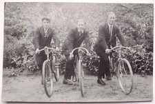 Three Men with Bicycles