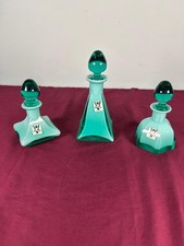 Set di tre bottiglie vintage