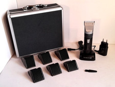 REMINGTON HC5810  tagliacapelli - 6 pettini, spazzola, carica batterie, valigia.