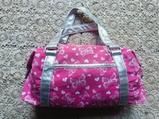 Borsa a mano fantasia e vera