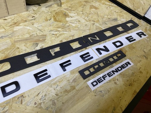Defender scritte nero opaco - defender,