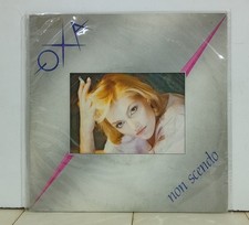 24249 45 giri 7" - Anna Oxa - Non scendo / Primo amore come stai - CBS 1984