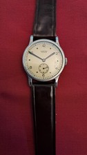 Orologio Lusina anni '30 cassa a moneta
