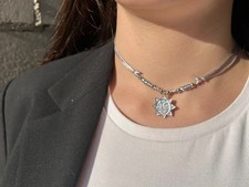 Collana choker grigio ciondolo sole perlato azzurro perline donna ragazza