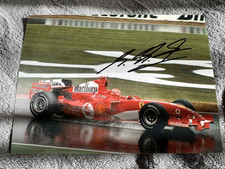 Michael Schumacher foto firmata 2005 Ferrari F1 Team. Certificato di autenticità