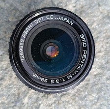 Grandangolo Pentax - M 1:3.5 28mm con custodia in pelle