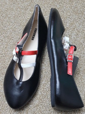 Scarpe da donna Sisley in pelle con cinturino piatto a contrasto nere taglia 34/US 3,5 PLS LEGGI