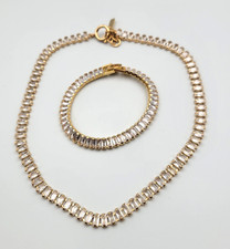 Set collana e bracciale strass tono oro taglio baguette tennis
