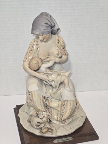 Statua madre bambino - e,