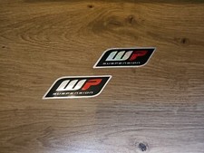 Adesivo logo sospensione