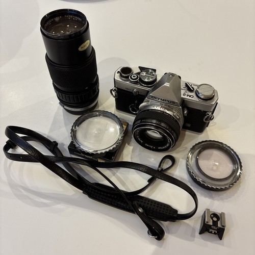 Olympus con pacchetto - con,